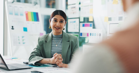 Meeting, creative and business woman in office for mobile app development, website and ui design. Digital agency, team and person with paperwork, ideas and layout for research, planning and softwareの写真素材