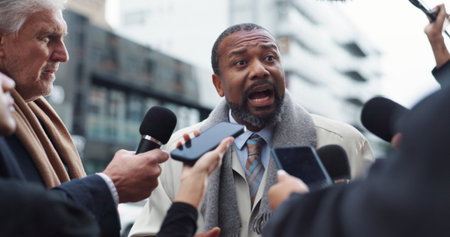Man, politician and discussion with journalists, city and press with election questions and talking. Outdoor, interview and minister with reporters for campaign update, media and people with micの写真素材