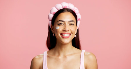 Moisturizer, skincare and portrait of woman in studio with natural, beauty and facial routine....