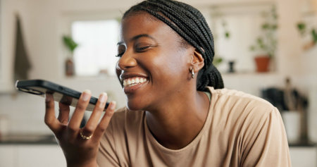Black woman, phone call and loudspeaker in home, laugh and funny story with conversation in kitchen....