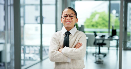 Arms crossed, portrait and smile of girl in office for cosplay, dress up or pretend career. About...