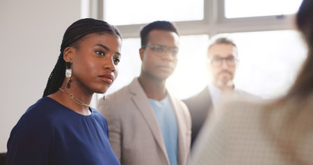 Attention, conversation and meeting with business people in office together for feedback or review. Collaboration, development and flare with employee group in corporate workplace for planningの写真素材