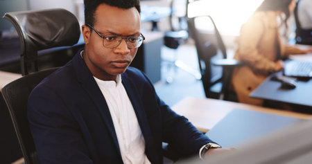 Computer, reading and report with business man in coworking office for planning or research....