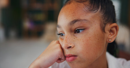 Thinking, student and memory with child in home for brainstorming, math solution and vision. Reflection, problem solving and education mindset with girl in house for studying, curious and ideaの写真素材