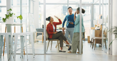 Creative, business people and high five in office for success, goal achievement and target. Happy...