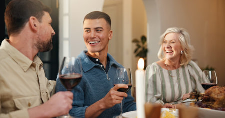 Happy, family and thanksgiving dinner in home for holiday season, eating together and conversation....