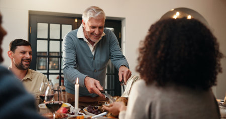Christmas, serving or people in home with meal, bonding together or buffet in festive celebration. Thanksgiving, host or family in house with wine, social gathering or connection at holiday table.の写真素材