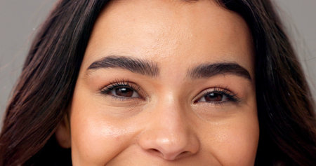 Portrait, woman and eyes in studio with microblading, eyelash extension and skincare for beauty....