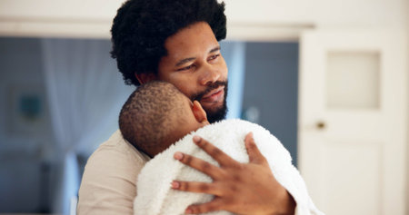 Home, hug and black father with baby, care and bonding together with love, dad and comfort. African family, apartment and infant with embrace, peaceful and childhood with safety and securityの写真素材