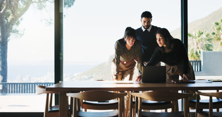 Collaboration, documents and laptop with business people in office for plan development. Computer,...