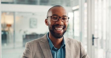 Smile, corporate and portrait of black man in office with confidence for finance career growth. Happy, professional and African male financial manager with pride for job development in workplace.の写真素材