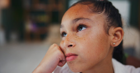 Thinking, student and vision with child in home for brainstorming, math solution and idea. Reflection, problem solving and education mindset with girl in house for studying, curious and memoryの写真素材