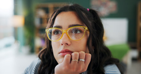 House, thinking and woman with glasses, college student and solution for assignment. Eyewear, university and person with contemplation, problem solving and phd research with decision, ideas or choiceの写真素材