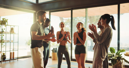 Fitness, yoga class or people in gym with applause, solidarity or coach recognition in end of training. Pilates, success or instructor in studio with clap, gratitude or finish in wellness club.の写真素材