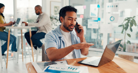 Media agency, phone call and man with laptop, discussion and subscription for magazine. People, email or sales consultant in office, pc or cellphone with online interview, communication and appの写真素材