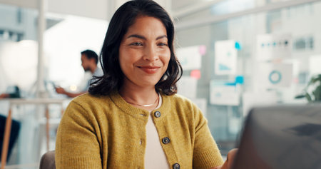 Creative, proofreading and woman with laptop, office or planning for ebook on website and publishing. Writer, happy and person with tech for review, project and editing novel for release and onlineの写真素材