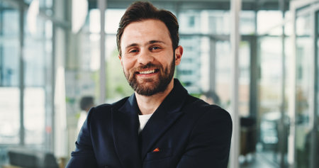 Happy, business and man with portrait in office for career pride, about us and reporting news. Happy, journalist and confident with ambition, copywriting experience and employee at publication agencyの写真素材