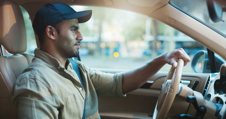 Drive, traffic and transport with man in car for commute, delivery or travel to destination. Ride, route and service with driver in vehicle for journey to location in urban city for transportationの写真素材