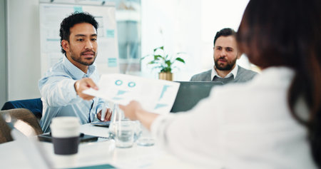 Business people, documents and graphs at office meeting with team, review or stats at finance company. Group, staff and planning with charts, asset management and feedback at investment agencyの写真素材