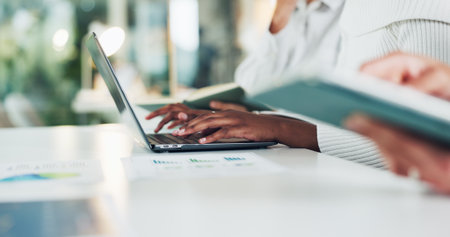 Hands, business and person with laptop in office for data analysis, finance report and profit stats. People, typing and pc with documents, financial infographic and revenue growth for risk assessmentの写真素材