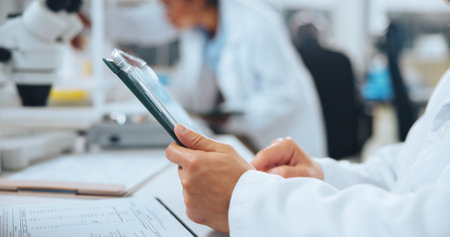 Person, hands or research with tablet in laboratory for medical analysis, news or breakthrough....