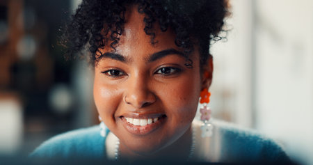 Reading, woman or laptop with smile in office for article revision, editing submission or newsletter. Creative agency, editor and tech for fact checking story with review and draft publicationの写真素材