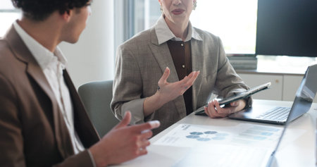 Documents, hands and tablet with business people in office for development or feedback. App,...