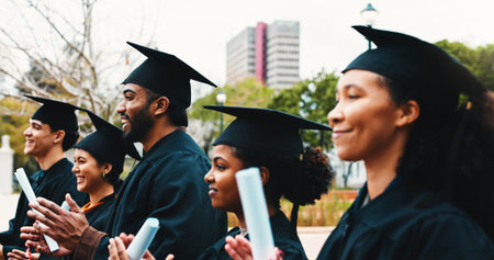 Applause, university and people with graduation, students and academic achievement with celebration....
