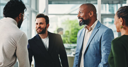 Shaking hands, meeting and business people for partnership, deal or thank you in office. B2B merger, team and handshake for welcome, congratulations or client introduction for collaboration agreementの写真素材