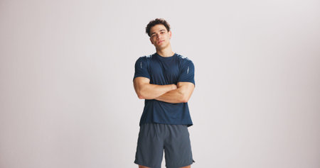 Portrait, fitness and man with arms crossed in studio for strength, exercise pride and healthy body....