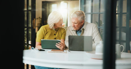 Laptop, planning and tablet with old couple in home for retirement fund, mortgage payment and...