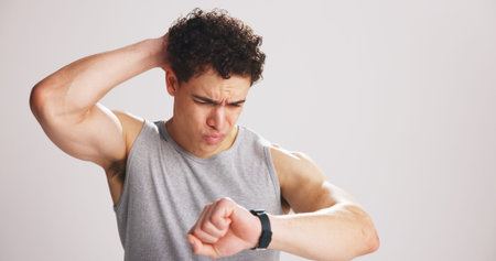 Fitness, tracking and watch with confused man on studio space for training or workout fail....