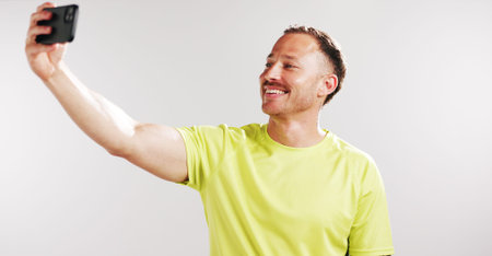 Selfie, happy and fitness with man in studio for social media gym membership promotion and memory....
