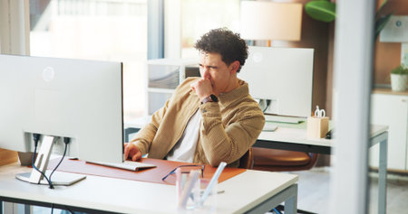 Business, tired and man in office, yawn and computer with deadline for column. Person, exhausted and...