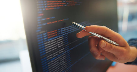 Analyze, code or hand in office with computer screen, software error or data check in debug process....
