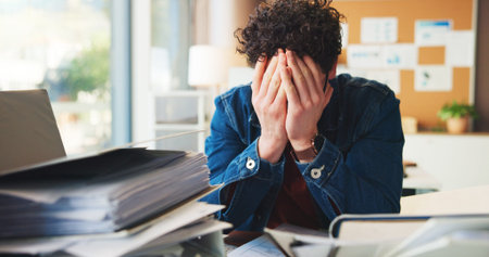 Overwhelmed, man or burnout in office with workload for marketing proposal, document pile or...