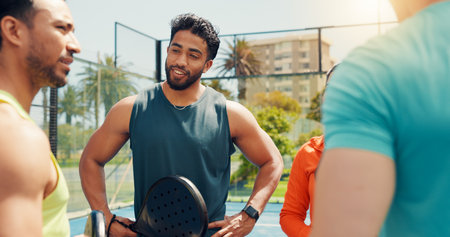 Smile, teamwork and padel racket with people on court for support, tournament and fitness. Tennis player, training and bonding with friends, partner and challenge for competition and sport workoutの写真素材