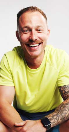 Happy, fitness and portrait of man in studio with confidence for exercise, training and sports...