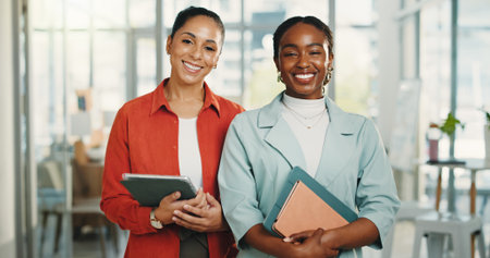 Portrait, team and women with tech, office or happy for story opportunity, journalists and creative. Confident, reporters and people with smile for career growth, media and collaboration in newsroomの写真素材