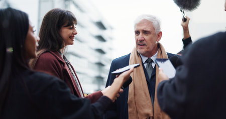 Politician, man or discussion with journalist for election announcement, campaign opinion or reaction. Mature person, crowd or media for politics question, conversation or mayor vote in New York Cityの写真素材