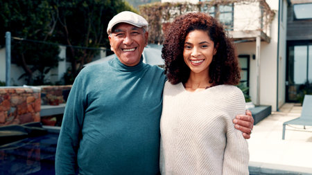 Happy, portrait and woman with senior father for hug, bonding or family time together outdoor....