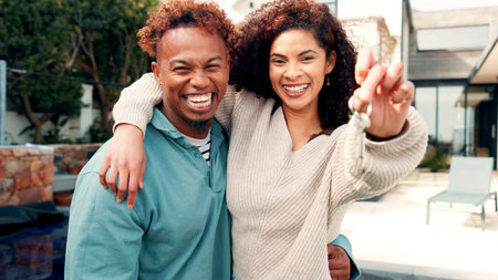 Happy couple, portrait and property with keys for investment, mortgage or new home together. Man, woman or smile with access or apartment building for real estate, homeowner or fresh start by houseの写真素材