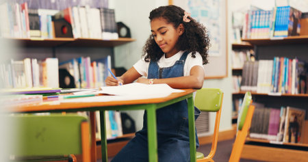 Library, learning and child with smile, writing or fine motor skills with knowledge, book and...
