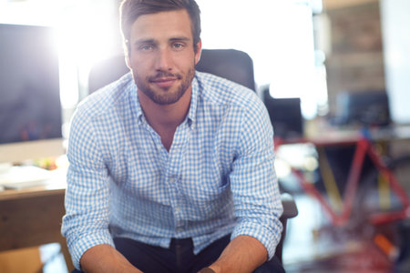 Marketing, portrait or man in office with confidence, career pride or job goals in creative agency. Space, smile or director in branding firm with flare, about us and experience as media planner.の写真素材