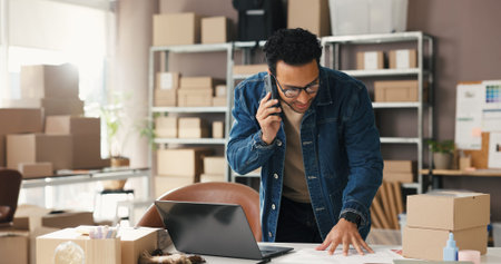 Small business, man or phone call with document in logistics for shipping, delivery invoice or...