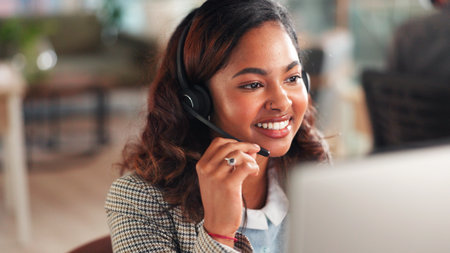 Call center, mic and woman with computer for telemarketing, sales or feedback. Technology, consultant and African person with headset for outbound communication, lead generation and smile in officeの写真素材