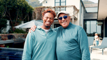 Real estate, portrait or men with hug by new house, excited or property purchase for smile. Sunglasses, senior father or happy son with embrace for moving in, achievement or homeowner with investmentの写真素材