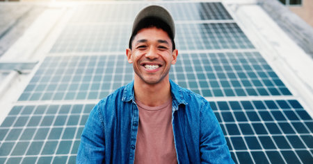 Happy, solar panels and portrait of man outdoor for renewable energy, sustainability and electricity. Photovoltaic, rooftop and person with grid for environment, alternative power and installationの写真素材