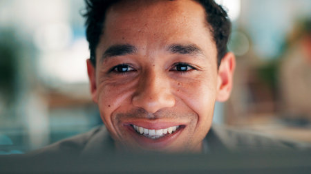 Employee, happy and man with computer, office and journalist with story for magazine or proofreading. Newsroom, reporter and person with technology for article publication, productivity and projectの写真素材