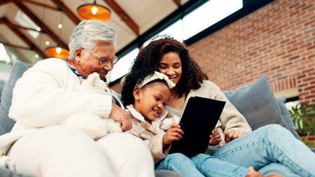 Mom, grandma and girl on couch with tablet, happy and low angle with movie, care and bonding. Senior...